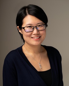 headshot of woman in glasses